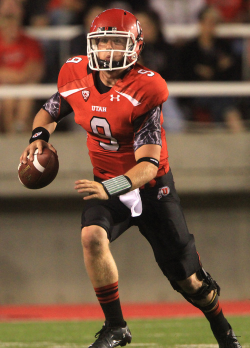 Rick Egan  | The Salt Lake Tribune 

Utah Utes quarterback Jon Hays (9) scrambles with the ball,  in Pac-12 action, Utah vs. University of Washington, at Rice-Eccles stadium, Saturday, October 1, 2011.