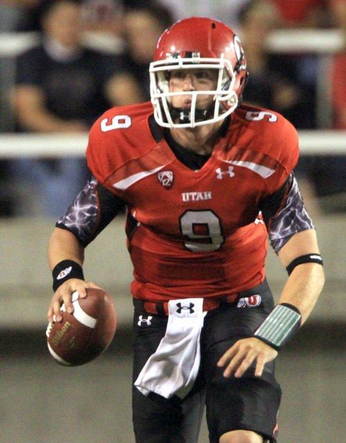 Rick Egan  | The Salt Lake Tribune 

Utah Utes quarterback Jon Hays (9) scrambles with the ball,  in Pac-12 action, Utah vs. University of Washington, at Rice-Eccles stadium, Saturday, October 1, 2011.