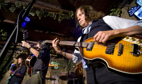 Douglas C. Pizac | Special to The Salt Lake Tribune
Beatles tribute band Revolver member Stephen Valdean performs on bass at The Hog Wallow Pub.