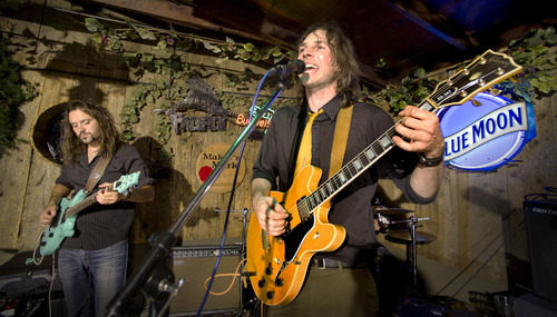 Douglas C. Pizac | Special to The Salt Lake Tribune
Beatles tribute band Revolver members Jason Sawyer and John Davis perform at The Hog Wallow Pub in the area of Old Mill.