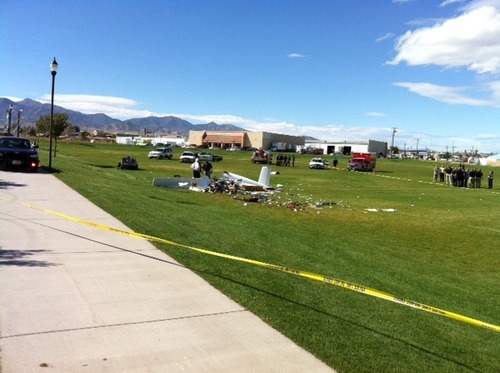 Steve Griffin | The Salt Lake Tribune
West Jordan police investigate a single-engine homemade plane crash Tuesday, Oct. 4, 2011. One man died at the scene and another was critically injured.