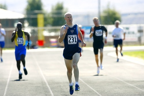 Tribune file photo
This year marks the 25th anniversary of the Huntsman World Senior Games. In this photo from the 2006 games, Jim Loftus of Fairbanks, Alaska, leads the pack during the 400-meter run for ages 55-59.