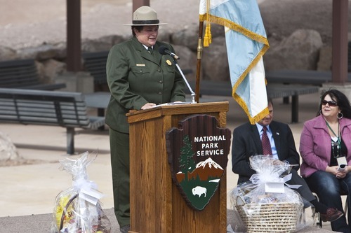 Chris Detrick  |  The Salt Lake Tribune
Mary Risser, Dinosaur National Monument superintendent, speaks during the Grand Opening Celebration of the Quarry Exhibit Hall at Dinosaur National Monument on Tuesday, Oct. 4, 2011. The old Quarry Exhibit Hall was closed in July 2006 due to safety hazards. The Carnegie Quarry contains nearly 1,500 fossils.  In addition to the fossil wall, the facility features exhibits about dinosaurs and other life from the Jurassic period.