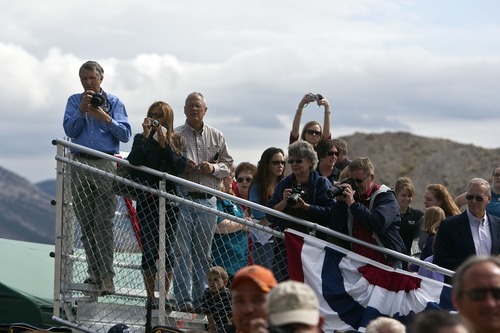 Chris Detrick  |  The Salt Lake Tribune
Spectators watch the ribbon cutting during the Grand Opening Celebration of the Quarry Exhibit Hall at Dinosaur National Monument on Tuesday, Oct. 4, 2011. The old Quarry Exhibit Hall was closed in July 2006 due to safety hazards. The Carnegie Quarry contains nearly 1,500 fossils.  In addition to the fossil wall, the facility features exhibits about dinosaurs and other life from the Jurassic period.