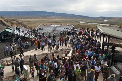 Chris Detrick  |  The Salt Lake Tribune
Spectators watch the ribbon cutting during the Grand Opening Celebration of the Quarry Exhibit Hall at Dinosaur National Monument on Tuesday, Oct. 4, 2011. The old Quarry Exhibit Hall was closed in July 2006 due to safety hazards. The Carnegie Quarry contains nearly 1,500 fossils.  In addition to the fossil wall, the facility features exhibits about dinosaurs and other life from the Jurassic period.
