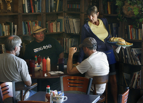 Scott Sommerdorf  |  The Salt Lake Tribune             
Kelly Johnson delivers lunch orders to a table of regulars - (left to right): Phil Brady, Ken Brady and Jim Andrews - at The Cottonwood Heights Cafe at 2577 E. Bengal Blvd., Cottonwood Heights, Thursday, Sept. 29, 2011.