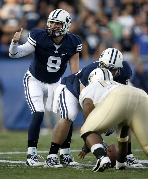 Trent Nelson  |  The Salt Lake Tribune
BYU quarterback Jake Heaps at the line of scrimmage against Central Florida at LaVell Edwards Stadium in Provo on Friday, Sept. 23, 2011.