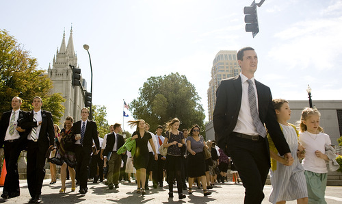Jeremy Harmon  |  The Salt Lake Tribune

Conferencegoers head toward the Conference Center on their way to the afternoon session of the 181st Semiannual General Conference of The Church of Jesus Christ of Latter-day Saints on Saturday.