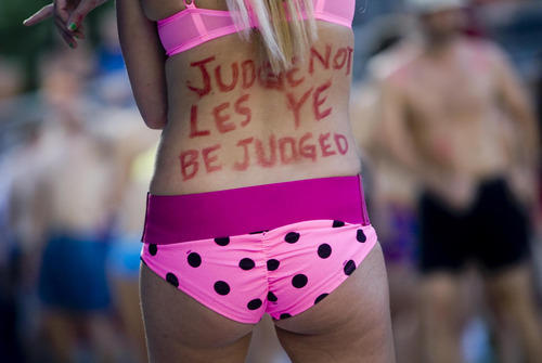 Djamila Grossman  |  The Salt Lake Tribune

The Utah Undie Run is a rally to encourage people in Utah to lighten up. People stand with slogans on their bodies as they wait for the start of the run at the Gallivan Center in Salt Lake City, Utah, on Saturday, Sept. 24, 2011.