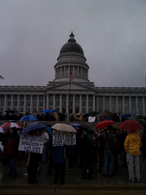 Leah Hogsten  |  The Salt Lake Tribune
Occupy SLC supporters brave rain and cold as they gather on Thursday near the State Capitol before marching downtown.