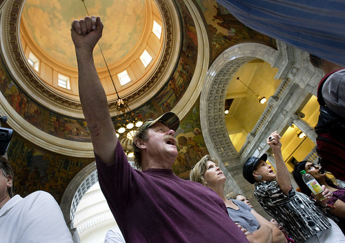 Scott Sommerdorf  |  Tribune File Photo             
Protesters angry about the Legislature's redistricting plans, chant 