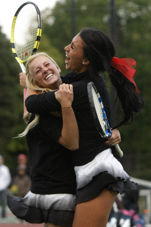 Chris Detrick  |  The Salt Lake Tribune
Alta's Ashley Anderson and Brie Beck celebrate after winning the 5A girls' doubles state tennis tournament against Lone Peak's Torie Wake and Lauren Lefrandt at Liberty Park Saturday October 8, 2011.