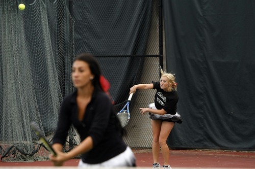 Chris Detrick  |  The Salt Lake Tribune
Alta's Ashley Anderson competes during the 5A girls' doubles state tennis tournament against Lone Peak's Torie Wake and Lauren Lefrandt at Liberty Park Saturday October 8, 2011.