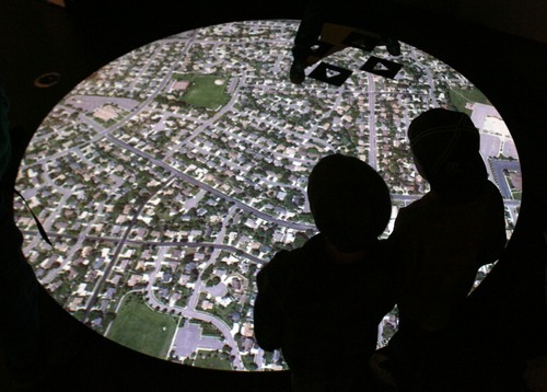 Steve Griffin  |  The Salt Lake Tribune


The new Leonardo museum , fashioned out of the old Salt Lake City Library, opened to the public on Saturday  October 8, 2011 in Salt Lake City Utah. Here people check out an interactive map that is controlled with your feet at top.