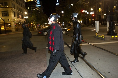 Chris Detrick  |  The Salt Lake Tribune
Members of the Black Monday Society 'Dead Nite,' Wally Gutierrez, 'Fool King,' and Dave Montgomery, 'Nihilist,' walk around during a Doomwatch night patrol in downtown Salt Lake City Sept. 22, 2011.