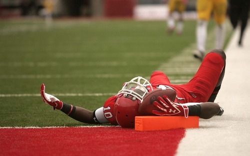 Trent Nelson  |  The Salt Lake Tribune
Utah receiver DeVonte Christopher prone near the end zone, where he was brought down on a long run that was called back on a penalty, Utah vs. Arizona State, college football at Rice-Eccles Stadium in Salt Lake City, Utah, Saturday, October 8, 2011.