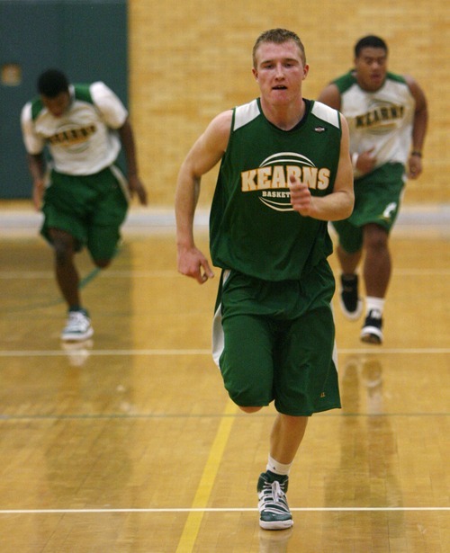 Steve Griffin  |  The Salt Lake Tribune

Kearns High School basektball player Dalton Noble runs gut wrenchers during practice at the high school in Kearns Monday, November 29, 2010.