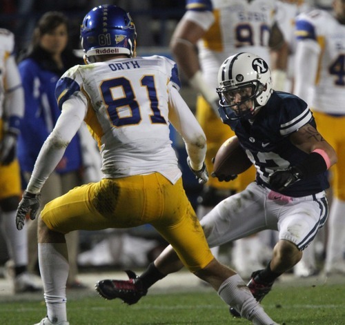 Rick Egan  | The Salt Lake Tribune 

DUPLICATE***Brigham Young Cougars wide receiver JD Falslev (12) faces San Jose State Spartans safety James Orth (81), in football action, BYU vs. San Jose State, at Lavell Edwards stadium, Saturday, October 8, 2011.