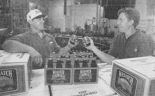 Tim Kelly  |  Tribune File Photo
Schirf Brewing Co. assistant brewmaster Jeff Campbell, left, and brewmaster Jim Hall toast the initial success of the company's new beer, Reserve Pale Ale in Aug. 1997.