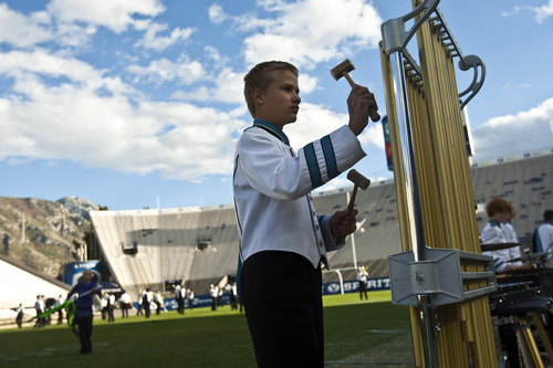 Chris Detrick  |  The Salt Lake Tribune
West Jordan's Raymond Gordon plays the chimes during the 33rd annual Rocky Mountain Marching Band Competition at LaVell Edwards Stadium Tuesday October 11, 2011.