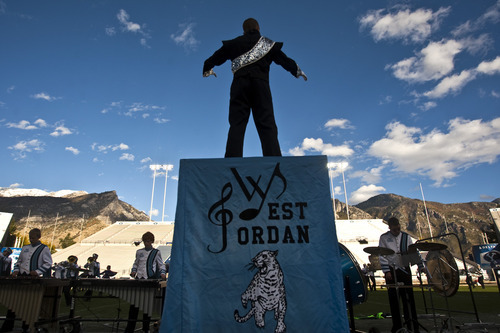 Chris Detrick  |  The Salt Lake Tribune
West Jordan drum major Bryson Chipman leads the marching band as they perform during the 33rd annual Rocky Mountain Marching Band Competition at LaVell Edwards Stadium Tuesday October 11, 2011.