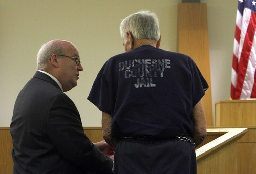 Rick Egan  | The Salt Lake Tribune 

Attorney Bill Morrison (left) stands with Charles Edward Dodd, during a preliminary hearing in the 8th District Court, in Duchesne, Thursday, October 13, 2011.  Dodd, 75, is charged with first-degree felony murder for the death of his ill wife. He allegedly tried to commit suicide after killing her.