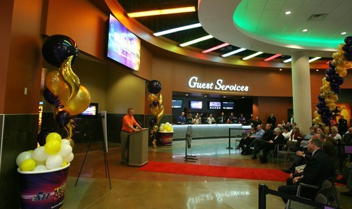 Steve Griffin  |  The Salt Lake Tribune


Greg Miller, CEO of Larry H. Miller Group, talks to guests during the opening of the new Megaplex Theatre at Legacy Crossing, in Centerville, Utah Thursday, October 13, 2011.