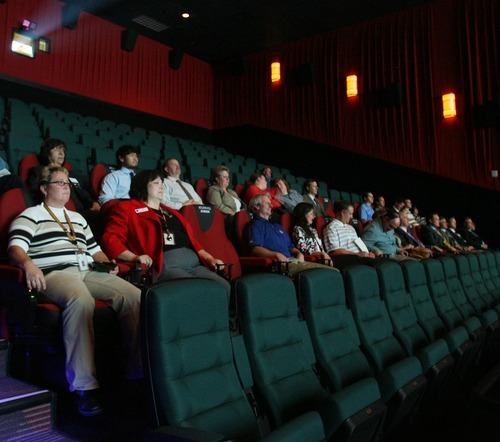 Steve Griffin  |  The Salt Lake Tribune


Guest get to experience the D-Box Motion technology seats that allow you to feel the movie by perfectly synchronizing the movement of your seat with the action on the screen during the opening of the new Megaplex Theatre at Legacy Crossing, in Centerville, Utah Thursday, October 13, 2011.