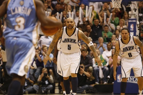 Tribune file photo

Utah Jazz's Carlos Boozer (5) and Utah Jazz's Deron Williams (8) keep an eye on Denver Nuggets' Ty Lawson (3) in the second half as the Jazz face the Nuggets during in the third game of the first round playoff series at EnergySolutions Arena in 2010.