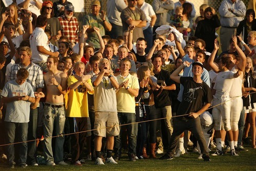 Trent Nelson  |  The Salt Lake Tribune
Skyline fans cheer on their team during the shootout. Skyline defeats Bountiful in a shootout, high school soccer playoffs, in Herriman, Utah, Thursday, October 13, 2011.