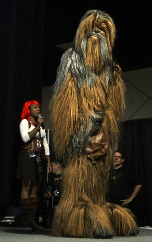 Rick Egan  | The Salt Lake Tribune 

Dartanyon Richards took second place with his performance of Chewbacaa from Star Wars  in the Cosplay competition, at the Geex convention, at the South Towne Expo Center, Saturday, October 15, 2011. The GEEX convention is a two-day convention sponsored by MediaOne that's about video games and geek culture.