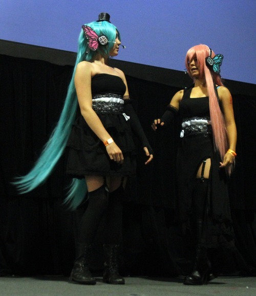 Rick Egan  | The Salt Lake Tribune 

Olivia Lassig as Hatsune Miku (left) and Megan Love as Megurine Luka, perform in the cosplay competition at the Geex convention, at the South Towne Expo Center, Saturday, October 15, 2011. The GEEX convention is a two-day convention sponsored by MediaOne that's about video games and geek culture.