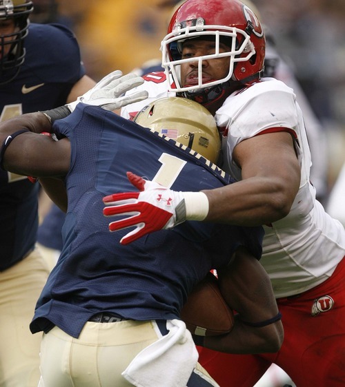 Trent Nelson  |  The Salt Lake Tribune
Utah's Derrick Shelby tackles Pitt running back Ray Graham during the first half. Utah vs. Pitt, college football at Heinz Field Stadium in Pittsburgh, Pennsylvania, Saturday, October 15, 2011.