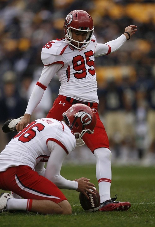 Trent Nelson  |  The Salt Lake Tribune
Utah kicker Coleman Petersen kicks a field goal during the first half. Utah vs. Pitt, college football at Heinz Field Stadium in Pittsburgh, Pennsylvania, Saturday, October 15, 2011. Holding is Sean Sellwood.