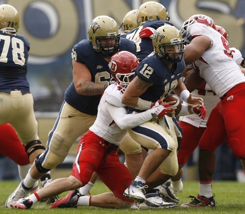 Trent Nelson  |  The Salt Lake Tribune
Utah's Trevor Reilly sacks Pitt quarterback Tino Sunseri during the first half. Utah vs. Pitt, college football at Heinz Field Stadium in Pittsburgh, Pennsylvania, Saturday, October 15, 2011.