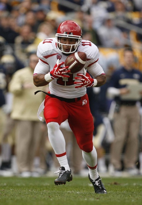 Trent Nelson  |  The Salt Lake Tribune
Utah receiver Luke Matthews catches the ball and scores a first half touchdown. Utah vs. Pitt, college football at Heinz Field Stadium in Pittsburgh, Pennsylvania, Saturday, October 15, 2011.