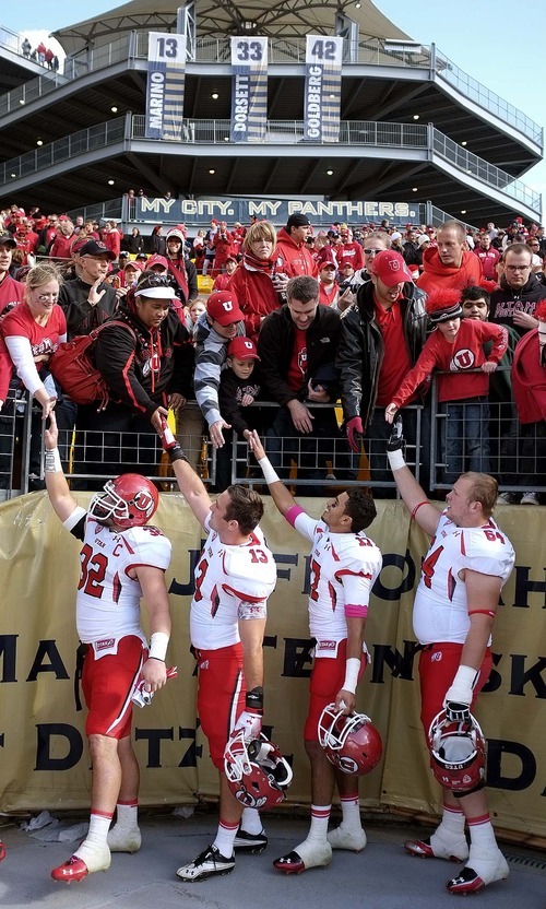 Trent Nelson  |  The Salt Lake Tribune
Utah reach out to their fans following the win. Utah vs. Pitt, college football at Heinz Field Stadium in Pittsburgh, Pennsylvania, Saturday, October 15, 2011.