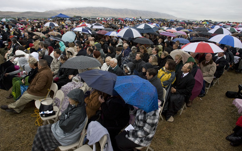 Steve Griffin  |  The Salt Lake Tribune


Thousands of LDS faithful braved the rainy weather as they attended a groundbreaking ceremony for the Payson Temple in Payson, Utah Saturday, October 8, 2011.
