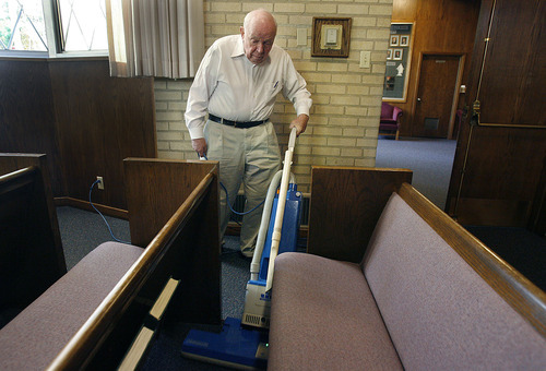Scott Sommerdorf  |  The Salt Lake Tribune             
J. Allen Kimball, a candidate for Mayor of Salt Lake City, vacuums between the pews inside the Federal Heights ward house Saturday, October 15, 2011. He and his wife Charlene get this duty twice a year.