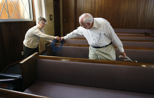 Scott Sommerdorf  |  The Salt Lake Tribune             
J. Allen Kimball, a candidate for mayor of Salt Lake City, hands off an extension cord to his wife Charlene as they take care of their twice-annual duty to help clean inside the Federal Heights ward house, Saturday, October 15, 2011.