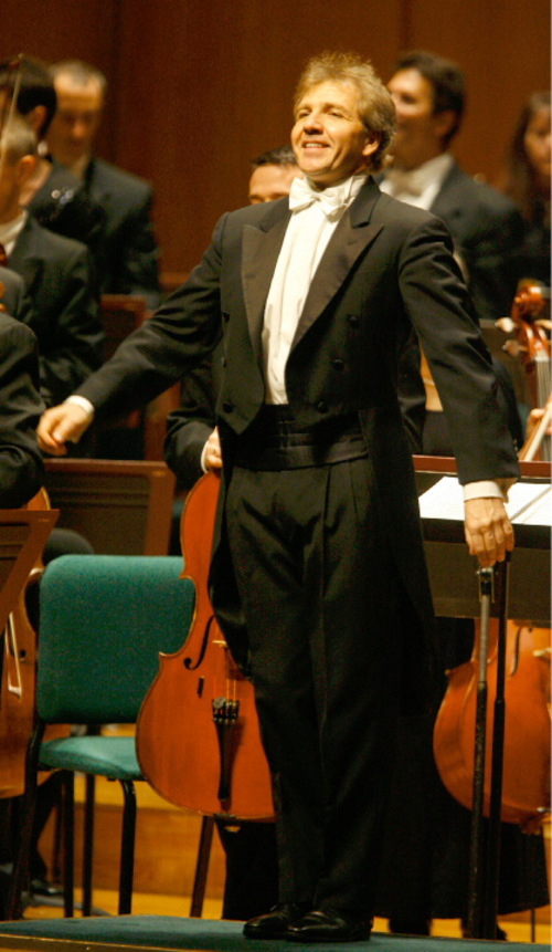 Rick Egan   |  The Salt Lake Tribune
Thierry Fischer acknowledges the crowd's applause, during his first appearance of his first season as Utah Symphony music director in September 2010.