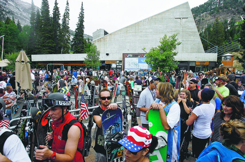 Tribune file photo
Summer skiers crowded the Snowbird Plaza on July 4, which fell on a Monday this year, creating a three-day weekend that helped lingering snow boost visitation to mountain resorts across much of the West.