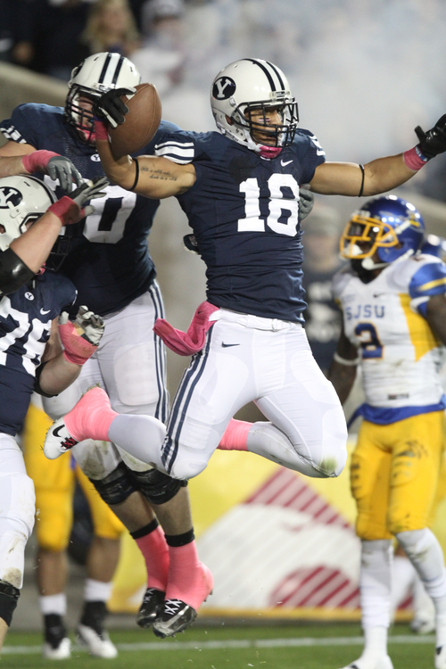 Rick Egan  | The Salt Lake Tribune 

 Brigham Young Cougars tight end Richard Wilson (18) celebrates a Cougar touchdown, in football action, BYU vs. San Jose State, at Lavell Edwards stadium, Saturday, October 8, 2011.