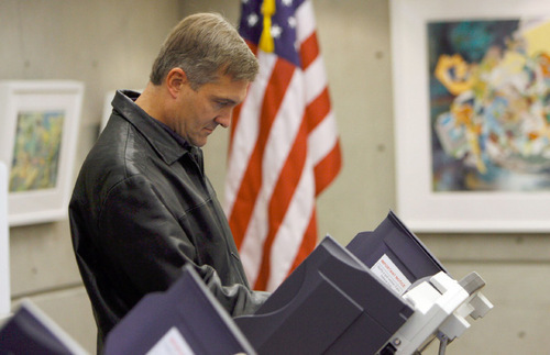 FILE PHOTO | The Salt Lake Tribune
Rep. Jim Matheson, D-Utah, shown in this photo casting a ballot in the 2010 election, isn't sure what office he'll run for next year -- governor, Senate or one of three newly drawn U.S. House districts.