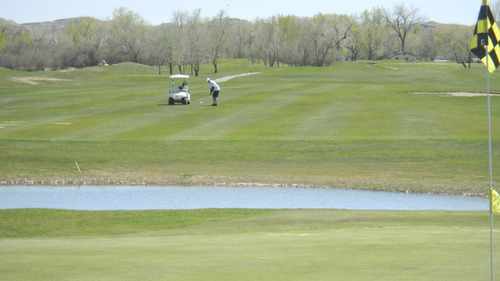 Tom Wharton  |  The Salt Lake Tribune
Todd McFarland, of East Carbon, hits shot on ninth hole of Green River State Park golf course, which is threatened with closure.