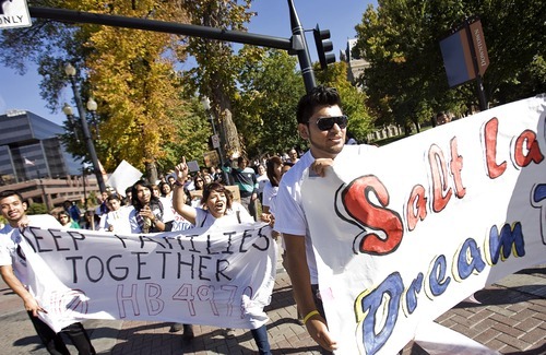 Djamila Grossman  |  The Salt Lake Tribune

People march downtown to protest the HB497 immigration bill near the City County Building in Salt Lake City, Utah, on Saturday, Sept. 22, 2011.