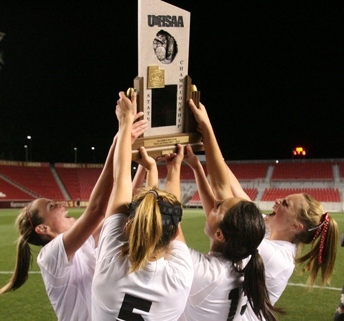 Steve Griffin  |  The Salt Lake Tribune


The Alta hold up the championship trophy after defeating Viewmont in the  girl's 5A state championship soccer at Rio Tinto Stadium in Sandy, Utah Friday, October 21, 2011.