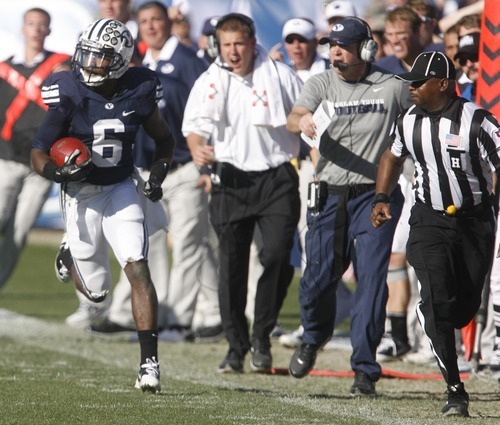 Rick Egan  | The Salt Lake Tribune 

Brigham Young Cougars defensive back Jordan Johnson (6),  runs with the ball after intercepting a Bengal pass,  in football action, BYU vs. Idaho State University football game, at Lavell Edwards Stadium, Saturday, October 22, 2011.