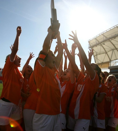 Leah Hogsten | The Salt Lake Tribune 
Ogden celebrates winning the 3A state girls soccer title with a 1-0 win over Cedar High at Rio Tinto Stadium in Sandy on Saturday.