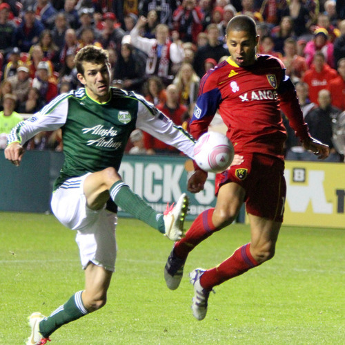 Stephen Holt/ Special to the Tribune
Real Salt Lake forward Alvaro Saborio pops in a shot on goal against the Portland Timbers during their 1-1 tie at Rio Tinto Stadium in Sandy.
